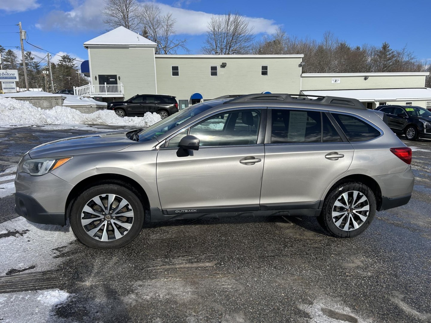 2015 Tungston /Tan Subaru Outback 2.5i Limited (4S4BSAJC2F3) with an 2.5L H4 DOHC 16V engine, 6-Speed Automatic transmission, located at 27 Main St., Norway, MD, 04268, (207) 743-0900, 44.199795, -70.530807- Photo#1