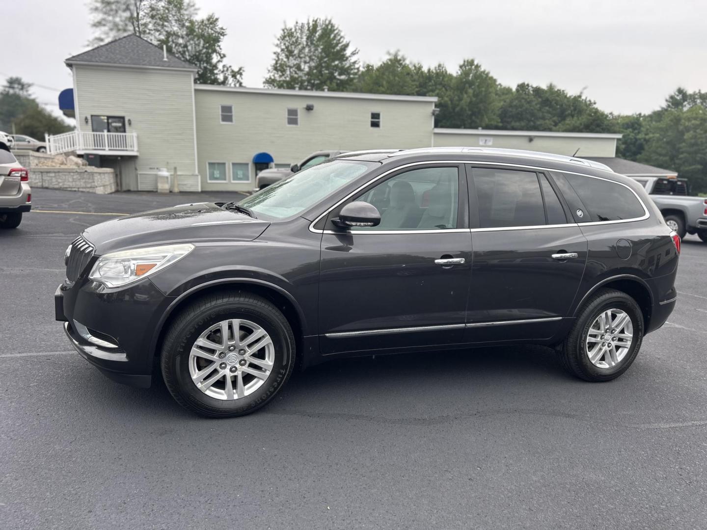 2014 Black /Gray Buick Enclave Convenience AWD (5GAKVAKD6EJ) with an 3.6L V6 DOHC 24V engine, 6-Speed Automatic Overdrive transmission, located at 27 Main St., Norway, MD, 04268, (207) 743-0900, 44.199795, -70.530807 - Photo#1
