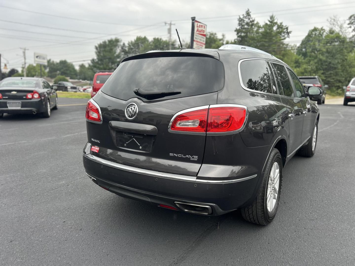 2014 Black /Gray Buick Enclave Convenience AWD (5GAKVAKD6EJ) with an 3.6L V6 DOHC 24V engine, 6-Speed Automatic Overdrive transmission, located at 27 Main St., Norway, MD, 04268, (207) 743-0900, 44.199795, -70.530807 - Photo#3