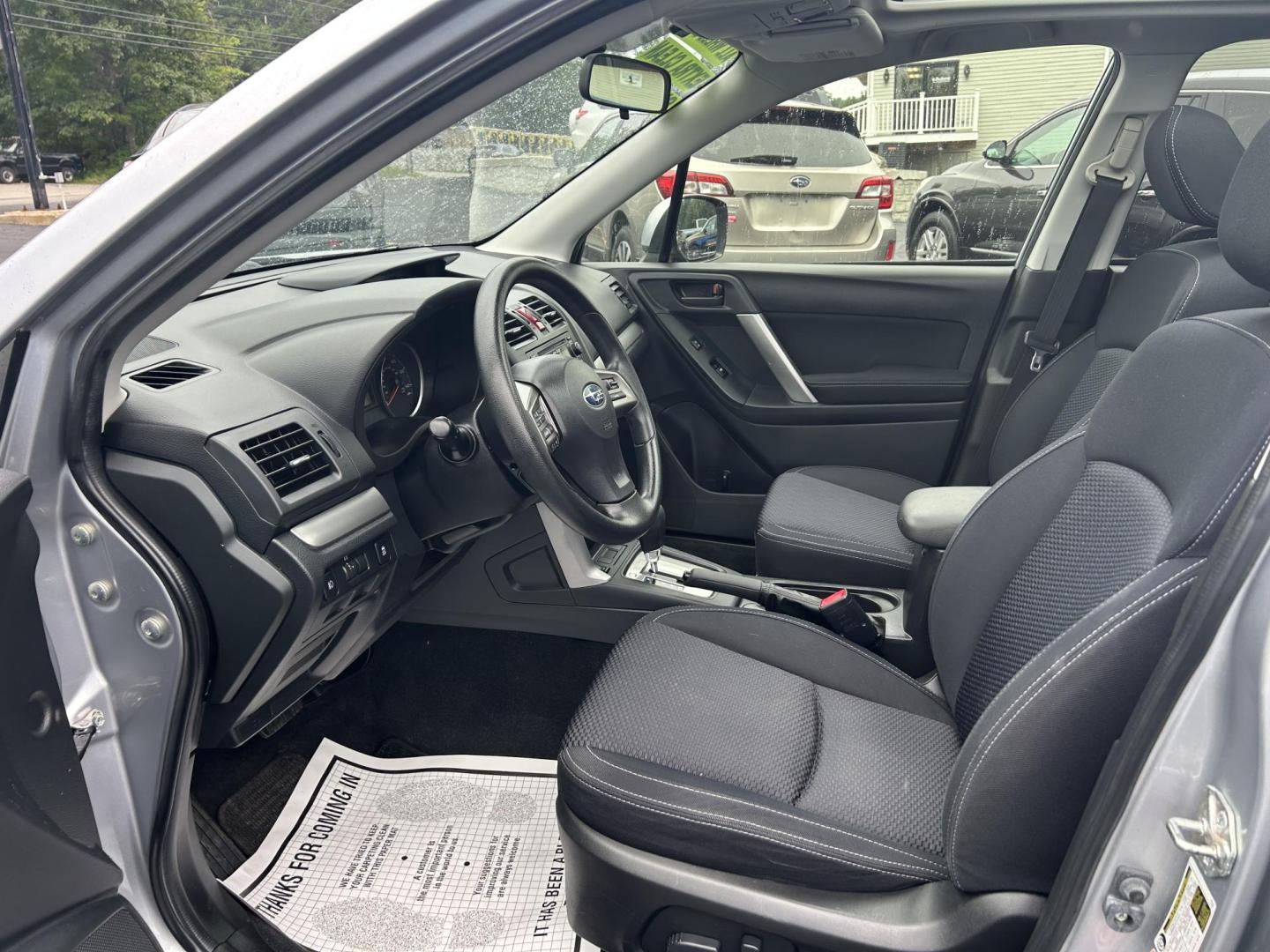 2015 Silver /Black Subaru Forester 2.5i Premium (JF2SJADC2FH) with an 2.5L H4 SOHC 16V engine, 6-Speed Automatic transmission, located at 27 Main St., Norway, MD, 04268, (207) 743-0900, 44.199795, -70.530807 - Photo#6