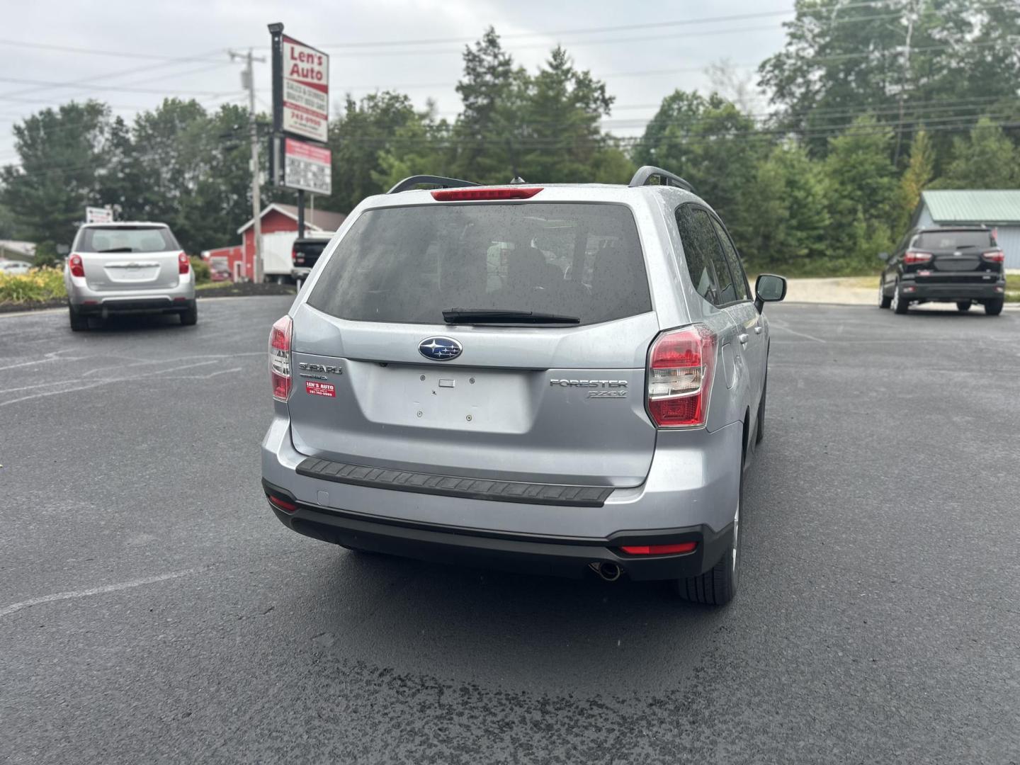 2015 Silver /Black Subaru Forester 2.5i Premium (JF2SJADC2FH) with an 2.5L H4 SOHC 16V engine, 6-Speed Automatic transmission, located at 27 Main St., Norway, MD, 04268, (207) 743-0900, 44.199795, -70.530807 - Photo#3