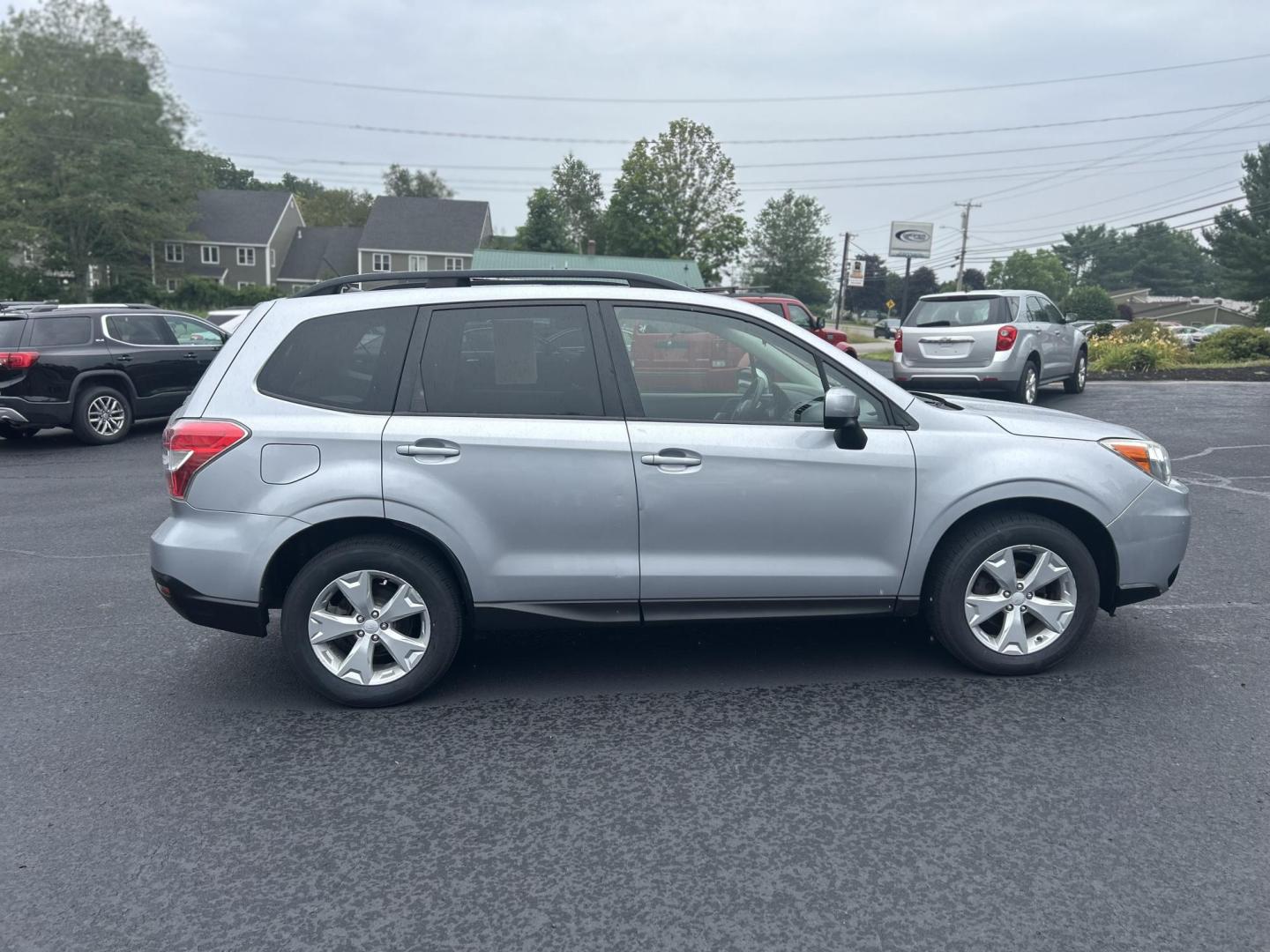 2015 Silver /Black Subaru Forester 2.5i Premium (JF2SJADC2FH) with an 2.5L H4 SOHC 16V engine, 6-Speed Automatic transmission, located at 27 Main St., Norway, MD, 04268, (207) 743-0900, 44.199795, -70.530807 - Photo#2