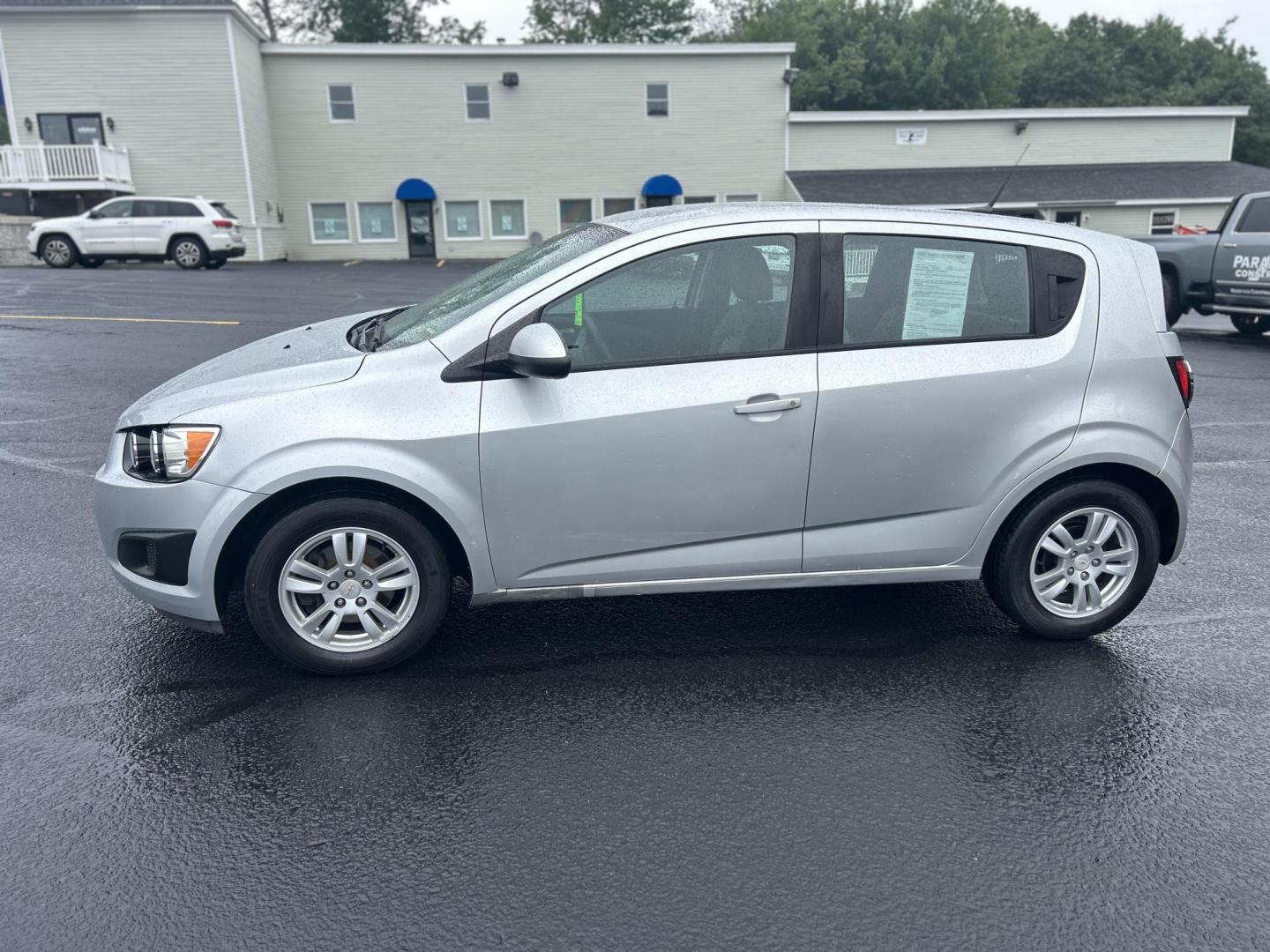 2012 Silver /Gray Chevrolet Sonic 1LS 5-Door (1G1JB6SH4C4) with an 1.8L L4 DOHC 24V FFV engine, 5-Speed Manual transmission, located at 27 Main St., Norway, MD, 04268, (207) 743-0900, 44.199795, -70.530807 - Photo#1