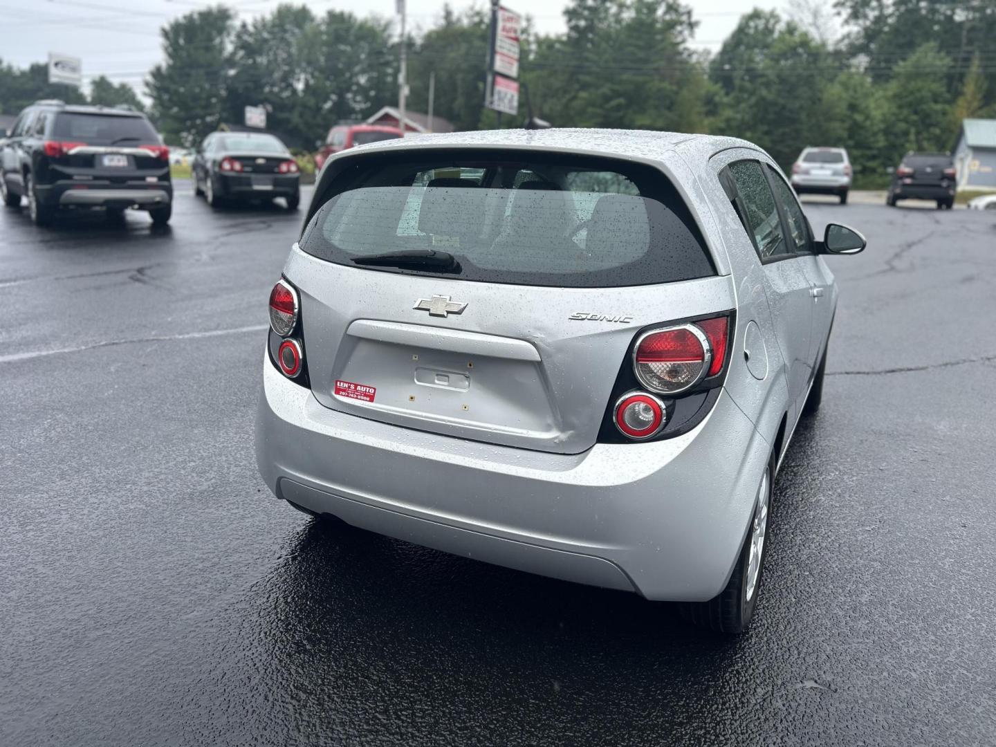 2012 Silver /Gray Chevrolet Sonic 1LS 5-Door (1G1JB6SH4C4) with an 1.8L L4 DOHC 24V FFV engine, 5-Speed Manual transmission, located at 27 Main St., Norway, MD, 04268, (207) 743-0900, 44.199795, -70.530807 - Photo#3