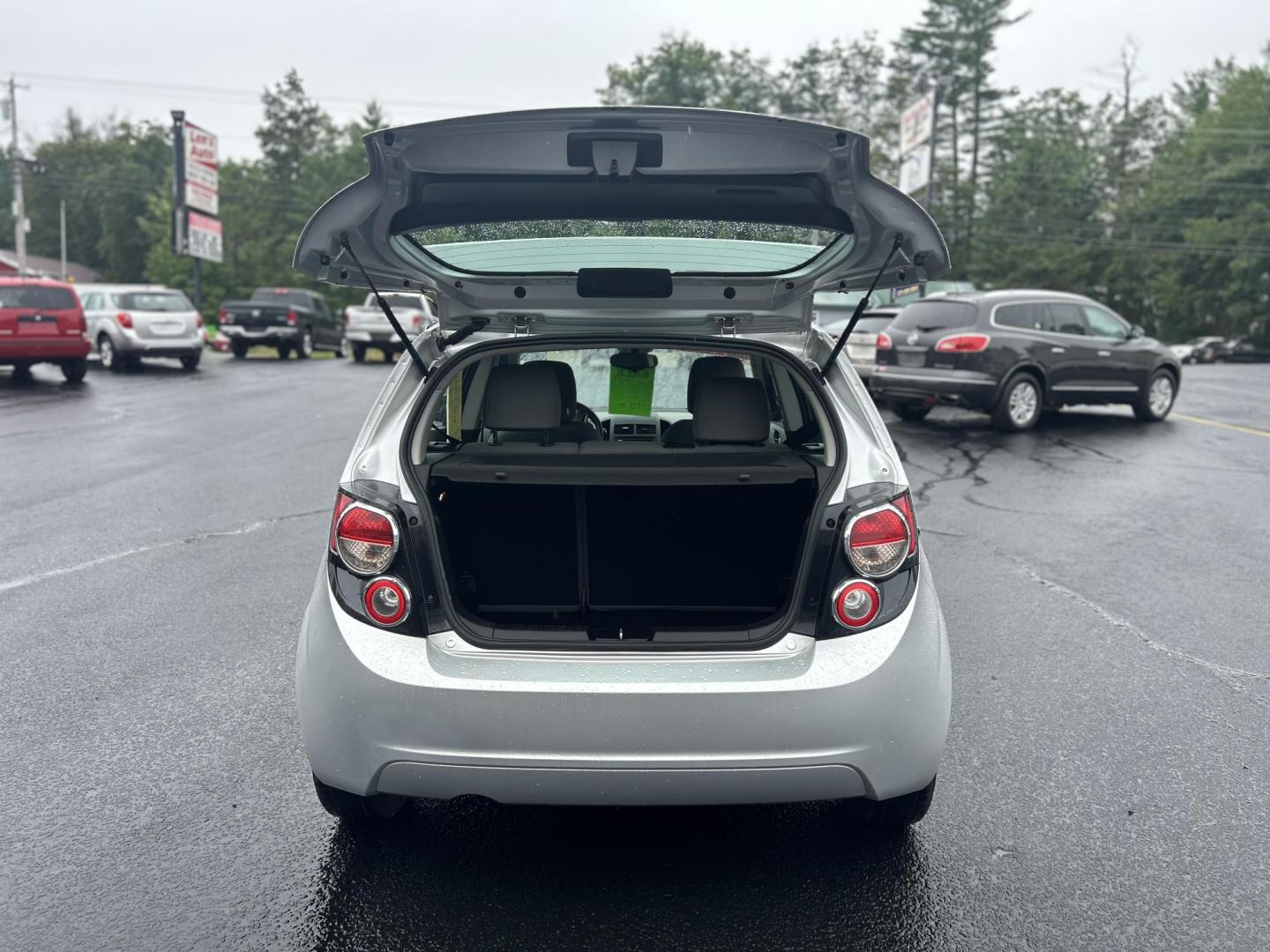 2012 Silver /Gray Chevrolet Sonic 1LS 5-Door (1G1JB6SH4C4) with an 1.8L L4 DOHC 24V FFV engine, 5-Speed Manual transmission, located at 27 Main St., Norway, MD, 04268, (207) 743-0900, 44.199795, -70.530807 - Photo#4