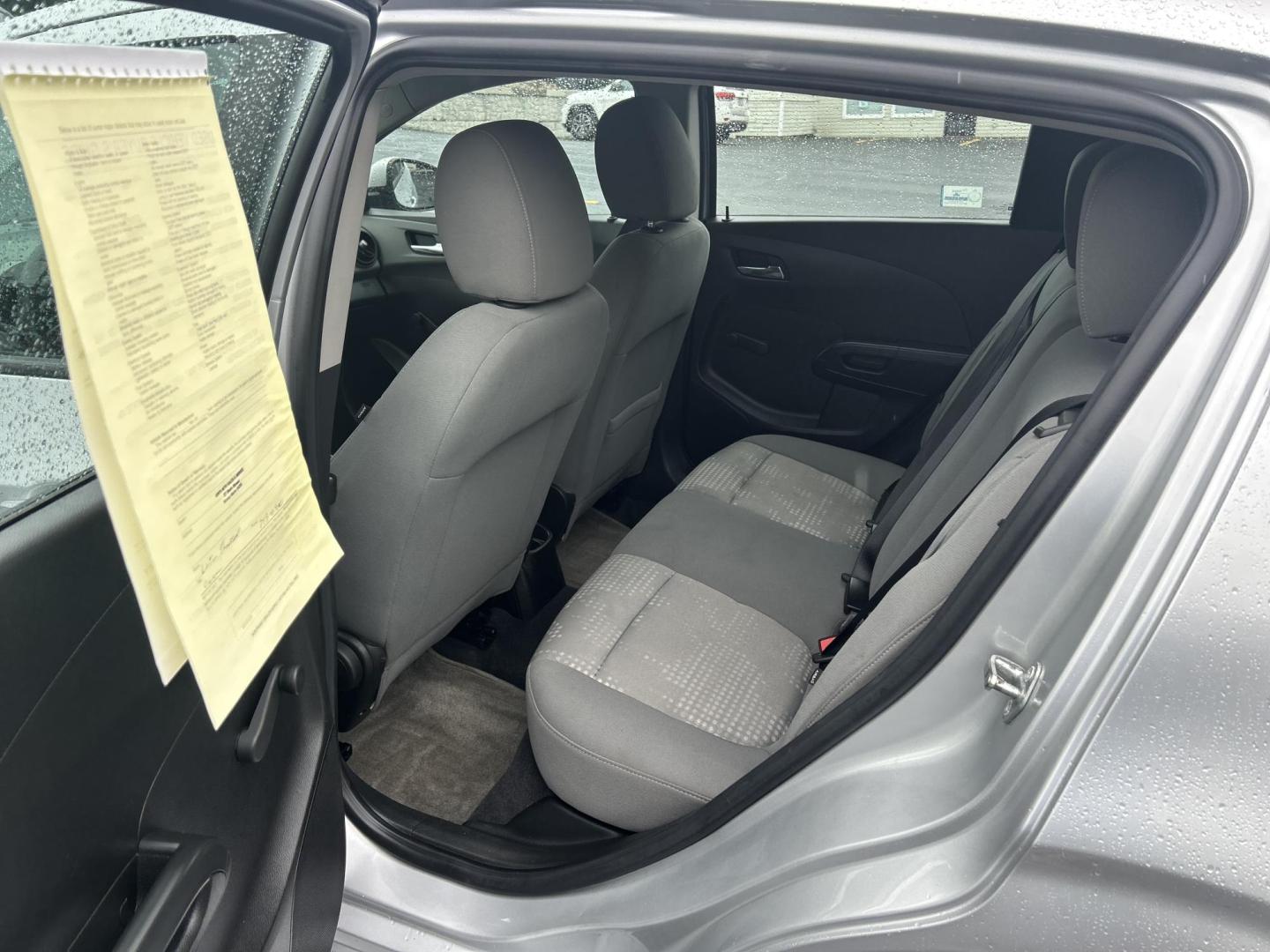 2012 Silver /Gray Chevrolet Sonic 1LS 5-Door (1G1JB6SH4C4) with an 1.8L L4 DOHC 24V FFV engine, 5-Speed Manual transmission, located at 27 Main St., Norway, MD, 04268, (207) 743-0900, 44.199795, -70.530807 - Photo#7