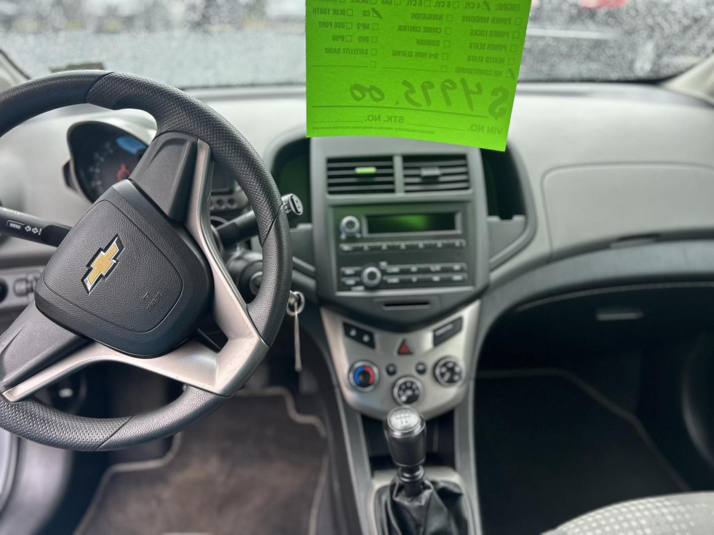 2012 Silver /Gray Chevrolet Sonic 1LS 5-Door (1G1JB6SH4C4) with an 1.8L L4 DOHC 24V FFV engine, 5-Speed Manual transmission, located at 27 Main St., Norway, MD, 04268, (207) 743-0900, 44.199795, -70.530807 - Photo#5