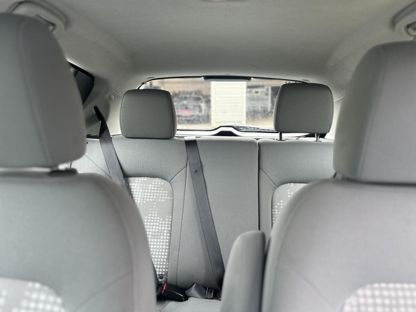 2012 Silver /Gray Chevrolet Sonic 1LS 5-Door (1G1JB6SH4C4) with an 1.8L L4 DOHC 24V FFV engine, 5-Speed Manual transmission, located at 27 Main St., Norway, MD, 04268, (207) 743-0900, 44.199795, -70.530807 - Photo#8