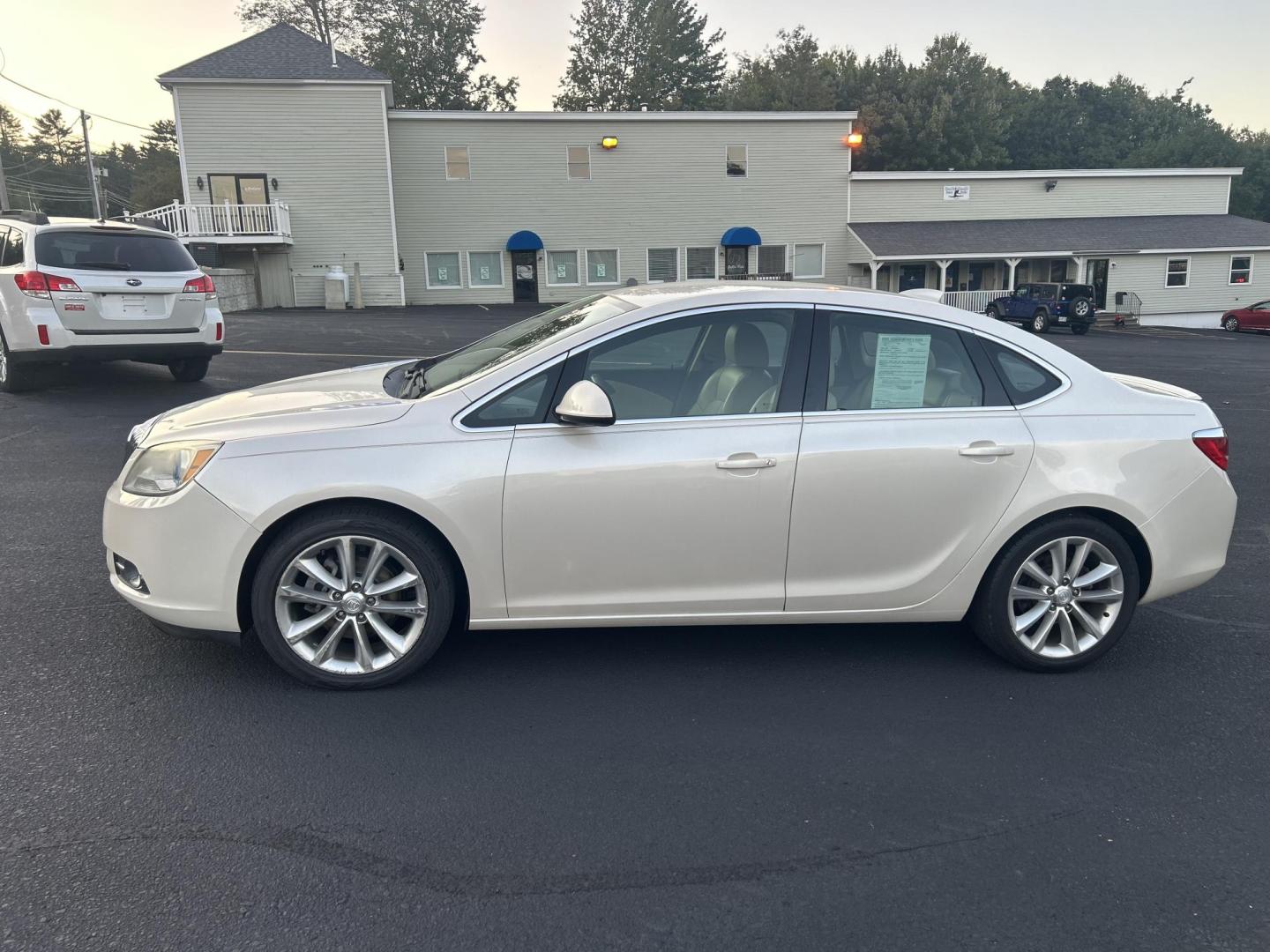 2015 white /Tan Buick Verano Convenience (1G4PR5SK2F4) with an 2.4L L4 DOHC 16V FFV engine, 6-Speed Automatic transmission, located at 27 Main St., Norway, MD, 04268, (207) 743-0900, 44.199795, -70.530807 - Photo#1