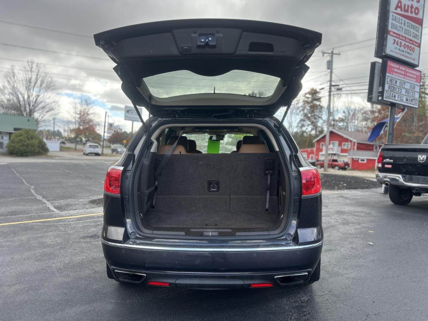 2015 Black /Brown Buick Enclave Premium AWD (5GAKVCKDXFJ) with an 3.6L V6 DOHC 24V engine, 6-Speed Automatic Overdrive transmission, located at 27 Main St., Norway, MD, 04268, (207) 743-0900, 44.199795, -70.530807 - Photo#4