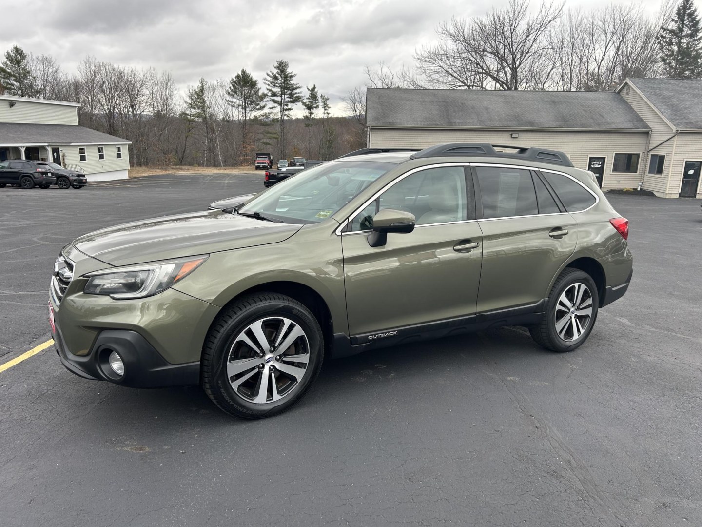 2018 Green /Tan Subaru Outback 2.5i Limited (4S4BSANC8J3) with an 2.5L H4 DOHC 16V engine, CVT transmission, located at 27 Main St., Norway, MD, 04268, (207) 743-0900, 44.199795, -70.530807- Photo#1