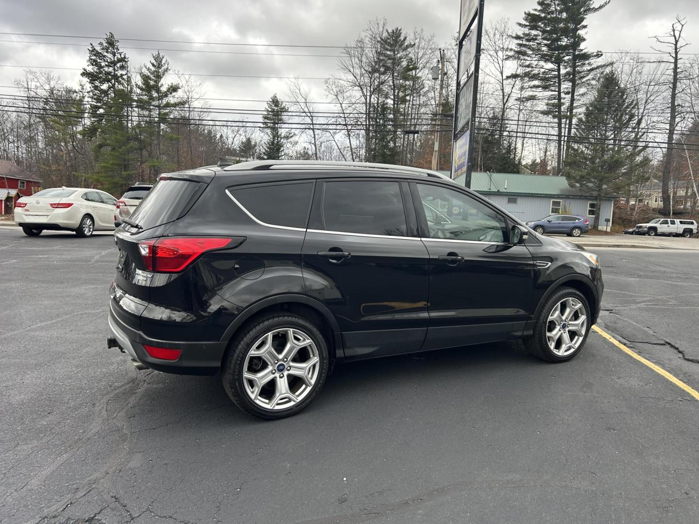 2019 Black /Black Ford Escape Titanium 4WD (1FMCU9J9XKU) with an 2.0L L4 DOHC 16V engine, 6A transmission, located at 27 Main St., Norway, MD, 04268, (207) 743-0900, 44.199795, -70.530807 - Photo#1