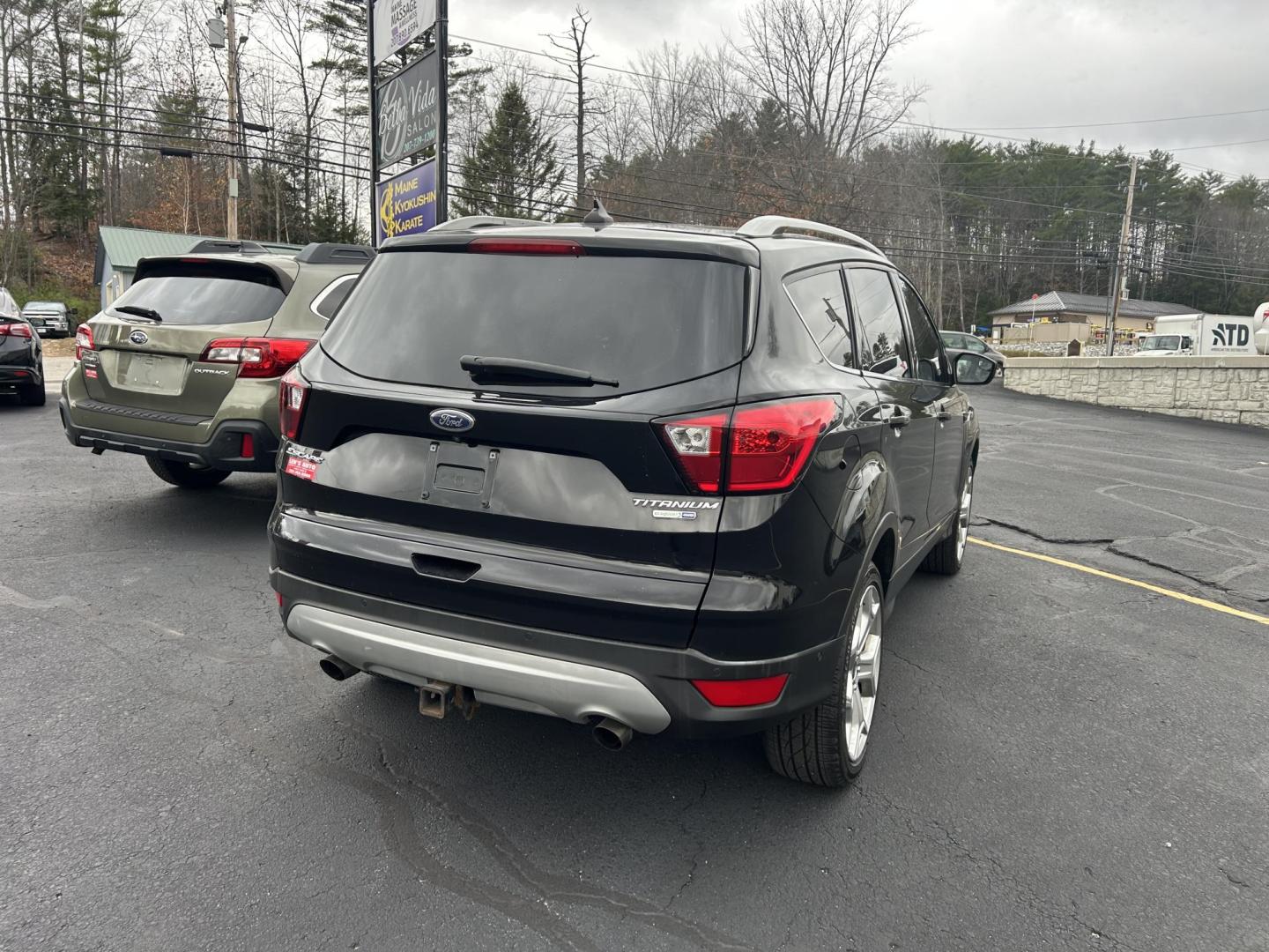 2019 Black /Black Ford Escape Titanium 4WD (1FMCU9J9XKU) with an 2.0L L4 DOHC 16V engine, 6A transmission, located at 27 Main St., Norway, MD, 04268, (207) 743-0900, 44.199795, -70.530807 - Photo#2