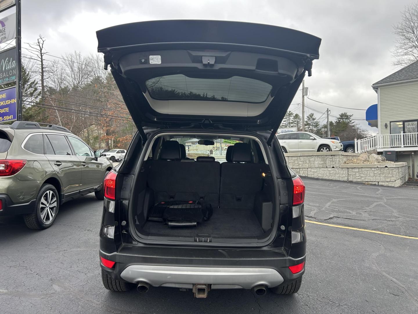 2019 Black /Black Ford Escape Titanium 4WD (1FMCU9J9XKU) with an 2.0L L4 DOHC 16V engine, 6A transmission, located at 27 Main St., Norway, MD, 04268, (207) 743-0900, 44.199795, -70.530807 - Photo#4
