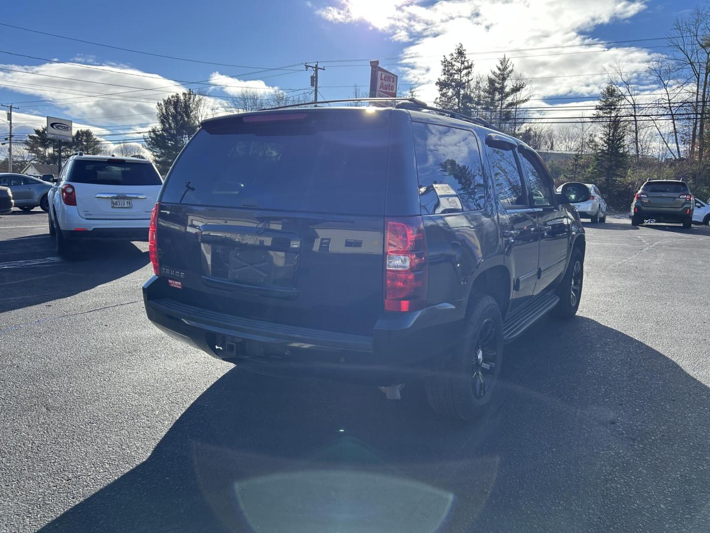 2013 Black /Black Chevrolet Tahoe LT 4WD (1GNSKBE04DR) with an 5.3L V8 OHV 16V FFV engine, 6-Speed Automatic transmission, located at 27 Main St., Norway, MD, 04268, (207) 743-0900, 44.199795, -70.530807 - Photo#2