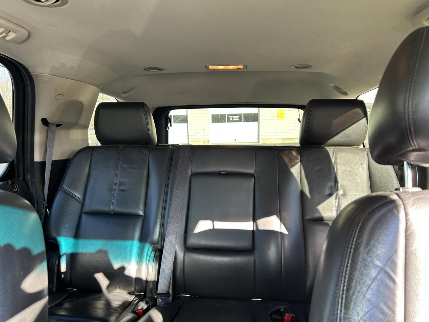 2013 Black /Black Chevrolet Tahoe LT 4WD (1GNSKBE04DR) with an 5.3L V8 OHV 16V FFV engine, 6-Speed Automatic transmission, located at 27 Main St., Norway, MD, 04268, (207) 743-0900, 44.199795, -70.530807 - Photo#7