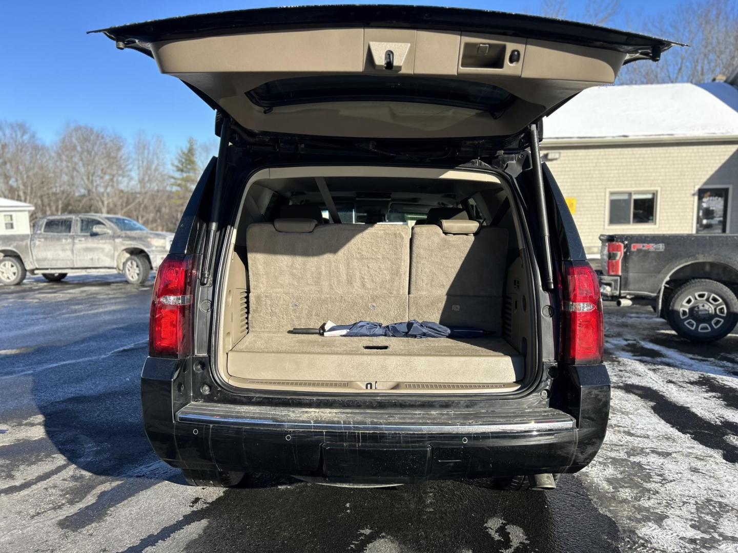 2018 Black /Tan Chevrolet Tahoe Premier 4WD (1GNSKCKCXJR) with an 5.3L V8 OHV 16V engine, 6A transmission, located at 27 Main St., Norway, MD, 04268, (207) 743-0900, 44.199795, -70.530807 - Photo#4