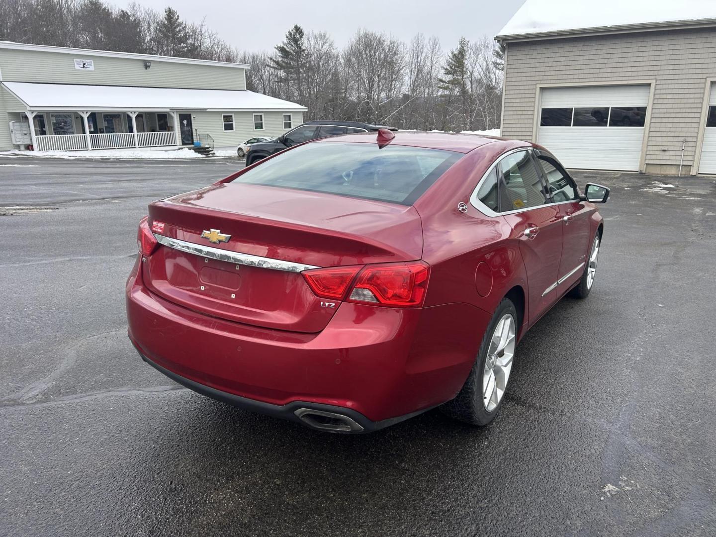 2015 Red /Black Chevrolet Impala 2LZ (2G1165S32F9) with an 3.6L V6 DOHC 24VV FFV engine, 6-Speed Automatic transmission, located at 27 Main St., Norway, MD, 04268, (207) 743-0900, 44.199795, -70.530807 - Photo#3