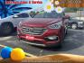 2017 Red /Tan Hyundai Santa Fe Sport 2.0T AWD (5XYZWDLA5HG) with an 2.0L L4 DOHC 16V TURBO engine, 6A transmission, located at 27 Main St., Norway, MD, 04268, (207) 743-0900, 44.199795, -70.530807 - Photo#0