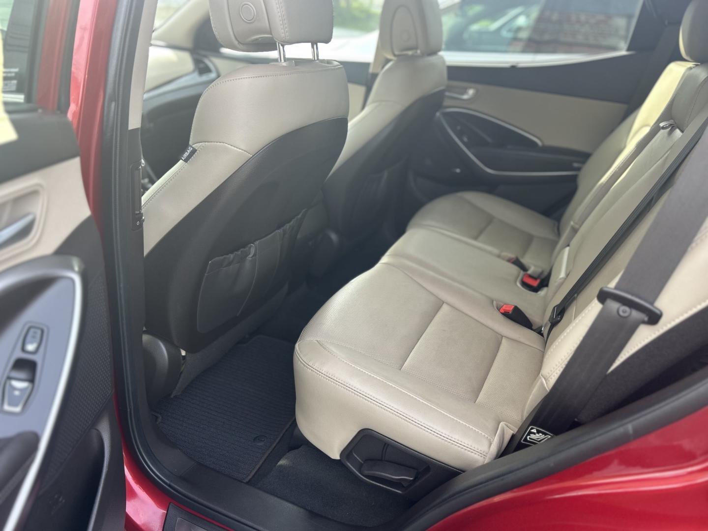 2017 Red /Tan Hyundai Santa Fe Sport 2.0T AWD (5XYZWDLA5HG) with an 2.0L L4 DOHC 16V TURBO engine, 6A transmission, located at 27 Main St., Norway, MD, 04268, (207) 743-0900, 44.199795, -70.530807 - Photo#9