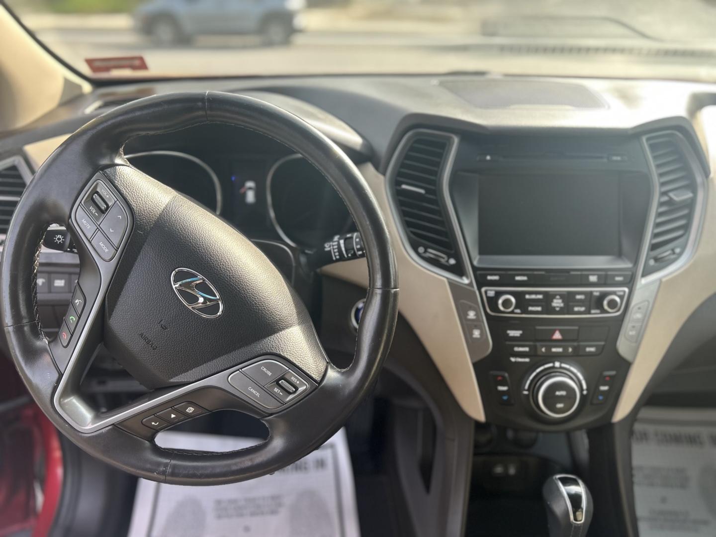 2017 Red /Tan Hyundai Santa Fe Sport 2.0T AWD (5XYZWDLA5HG) with an 2.0L L4 DOHC 16V TURBO engine, 6A transmission, located at 27 Main St., Norway, MD, 04268, (207) 743-0900, 44.199795, -70.530807 - Photo#5