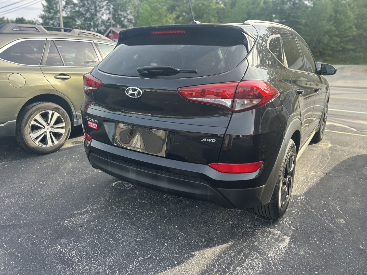 2017 Black /Black Hyundai Tucson SE w/Preferred Package AWD (KM8J3CA40HU) with an 2.0L L4 DOHC 16V engine, 6A transmission, located at 27 Main St., Norway, MD, 04268, (207) 743-0900, 44.199795, -70.530807- Photo#3