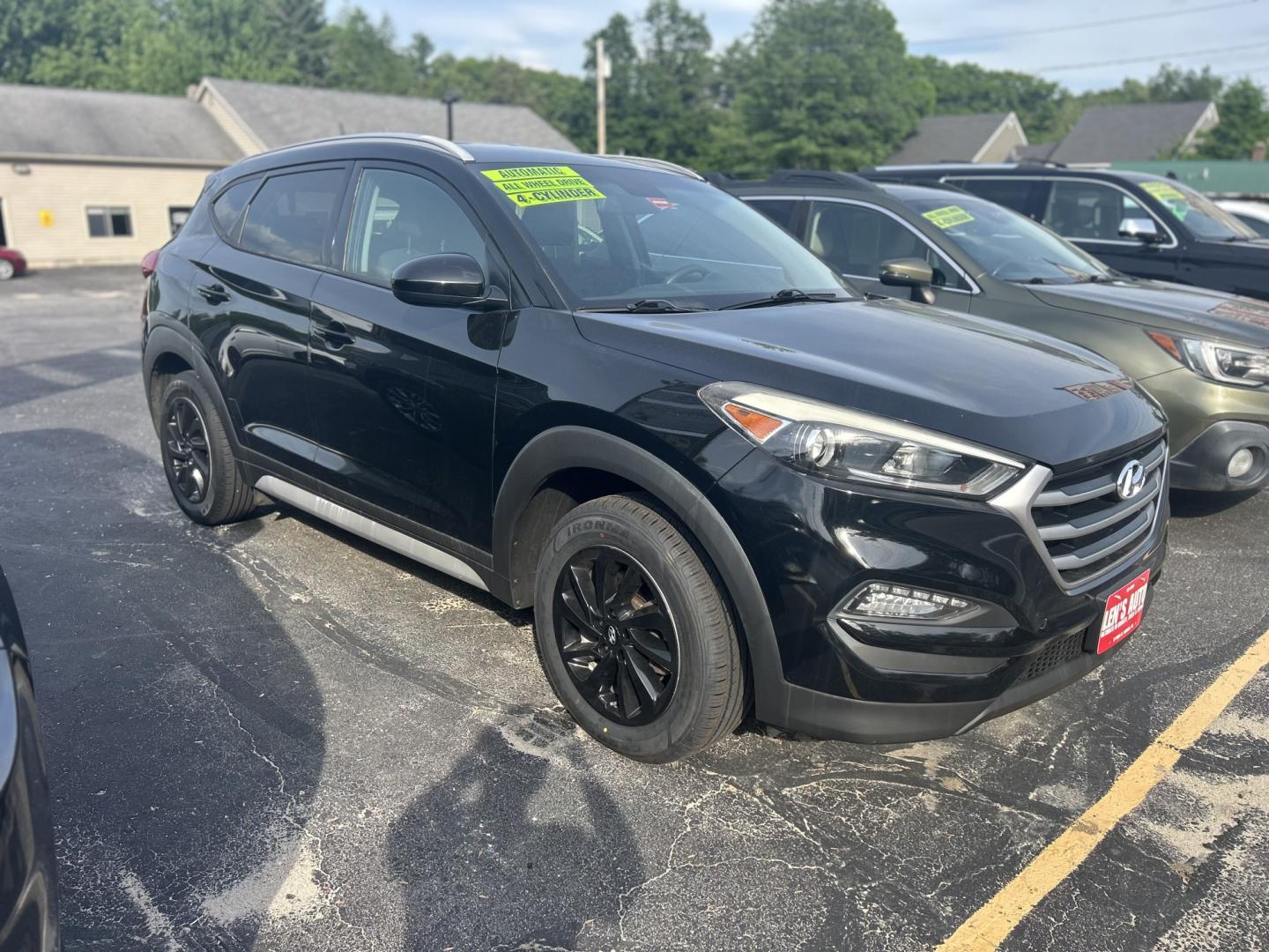2017 Black /Black Hyundai Tucson SE w/Preferred Package AWD (KM8J3CA40HU) with an 2.0L L4 DOHC 16V engine, 6A transmission, located at 27 Main St., Norway, MD, 04268, (207) 743-0900, 44.199795, -70.530807 - Photo#2