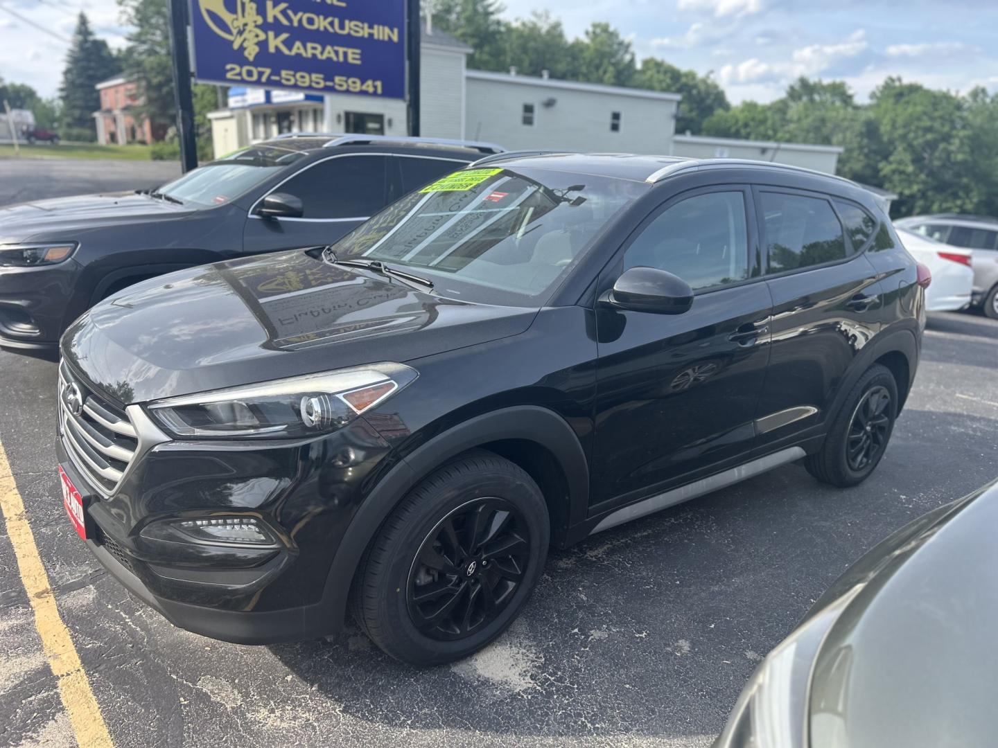 2017 Black /Black Hyundai Tucson SE w/Preferred Package AWD (KM8J3CA40HU) with an 2.0L L4 DOHC 16V engine, 6A transmission, located at 27 Main St., Norway, MD, 04268, (207) 743-0900, 44.199795, -70.530807 - Photo#1
