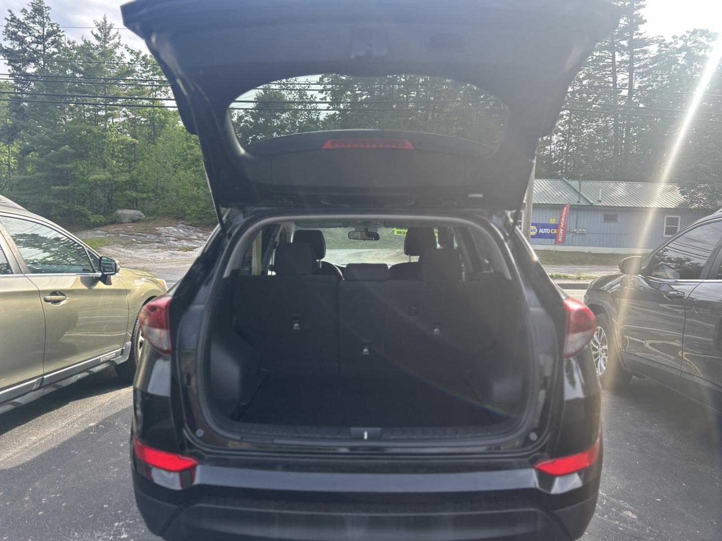 2017 Black /Black Hyundai Tucson SE w/Preferred Package AWD (KM8J3CA40HU) with an 2.0L L4 DOHC 16V engine, 6A transmission, located at 27 Main St., Norway, MD, 04268, (207) 743-0900, 44.199795, -70.530807 - Photo#4