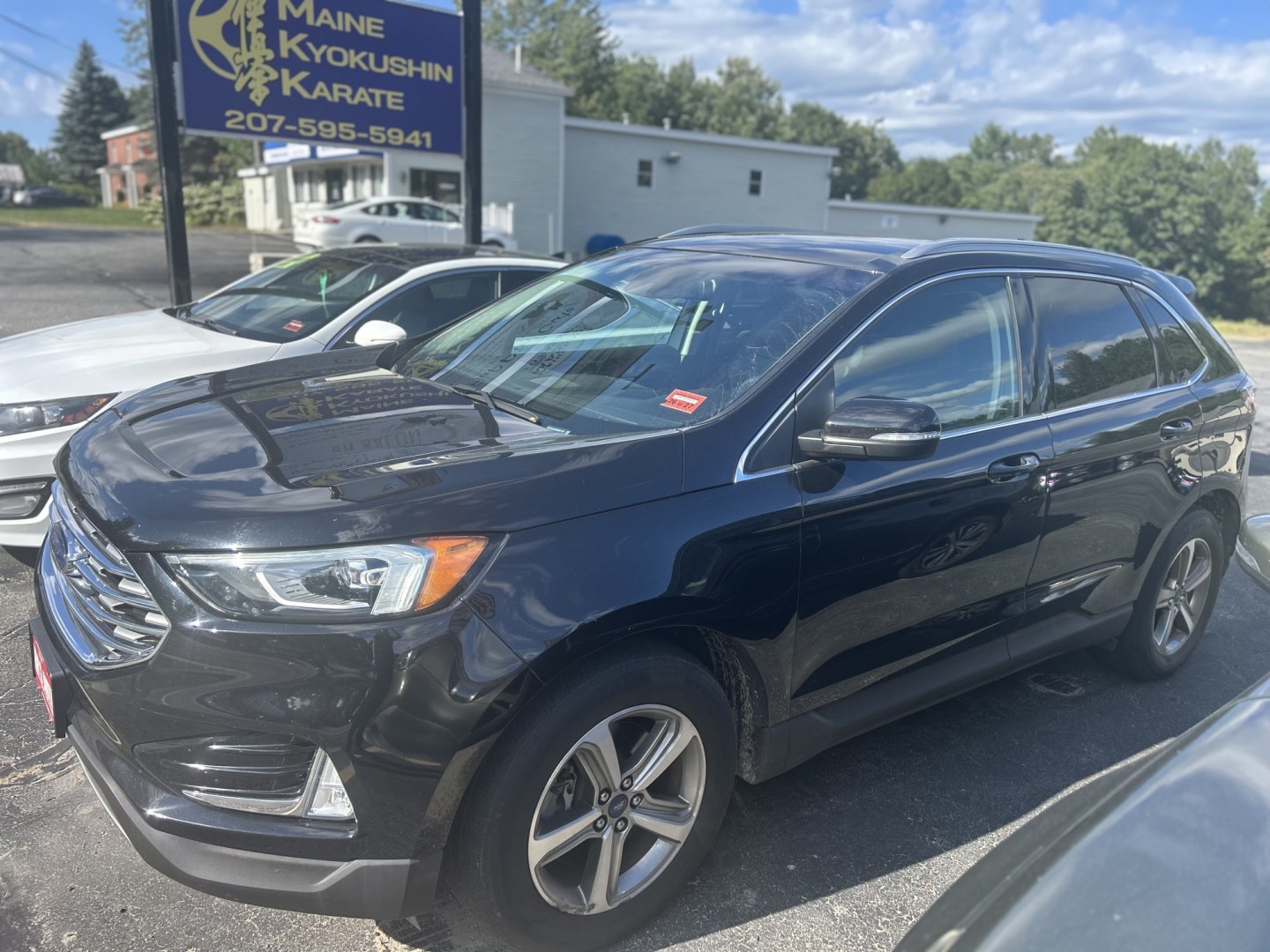 2019 Black /Black Ford Edge SEL AWD (2FMPK4J99KB) with an 2.0L L4 DOHC 16V engine, 6A transmission, located at 27 Main St., Norway, MD, 04268, (207) 743-0900, 44.199795, -70.530807- Photo#1